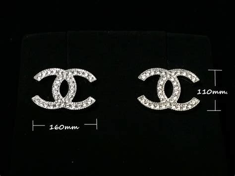 mens chanel earrings|chanel symbol earrings.